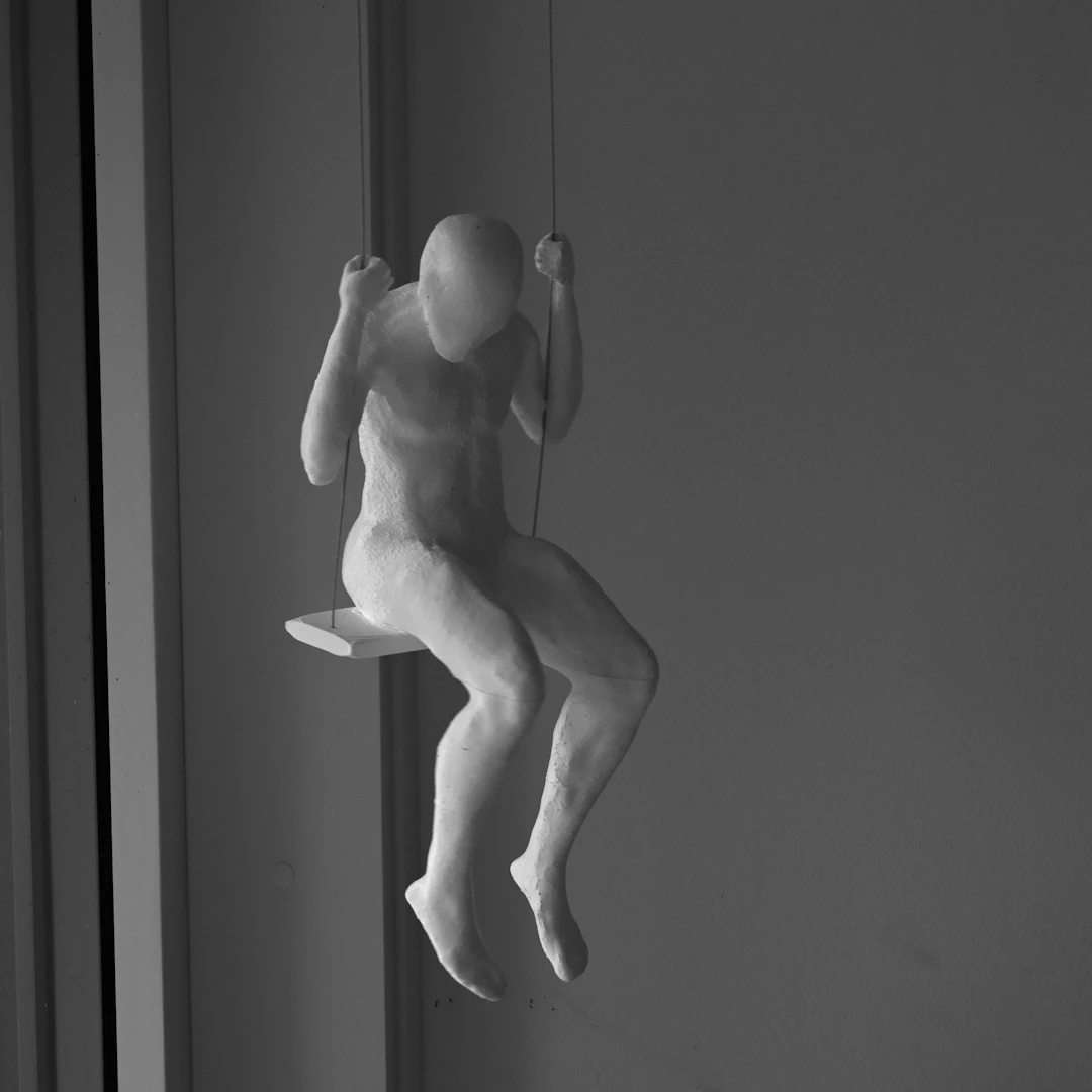 Sculpture by Ivo Meier - climbing high